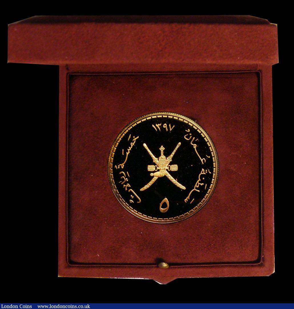 London Coins : A192 : Lot 357 : Oman 5 Omani Rials AH1397 (1976)  Sultan Qabus 7th Anniversary Gold Proof KM62 nFFC in the Central B...