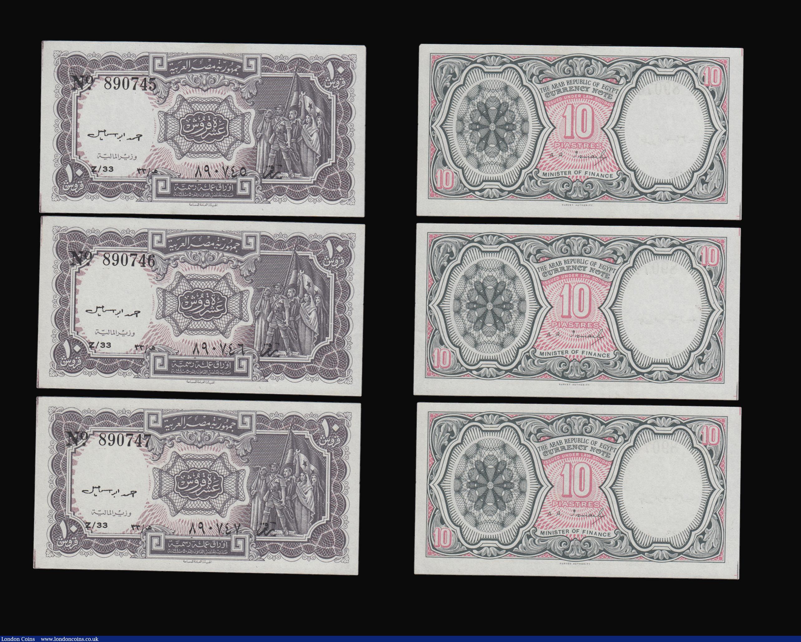 London Coins : A193 : Lot 107 : Egypt 10 Piastres The Arab Republic of Egypt red on black and white group of militants with flag pre...