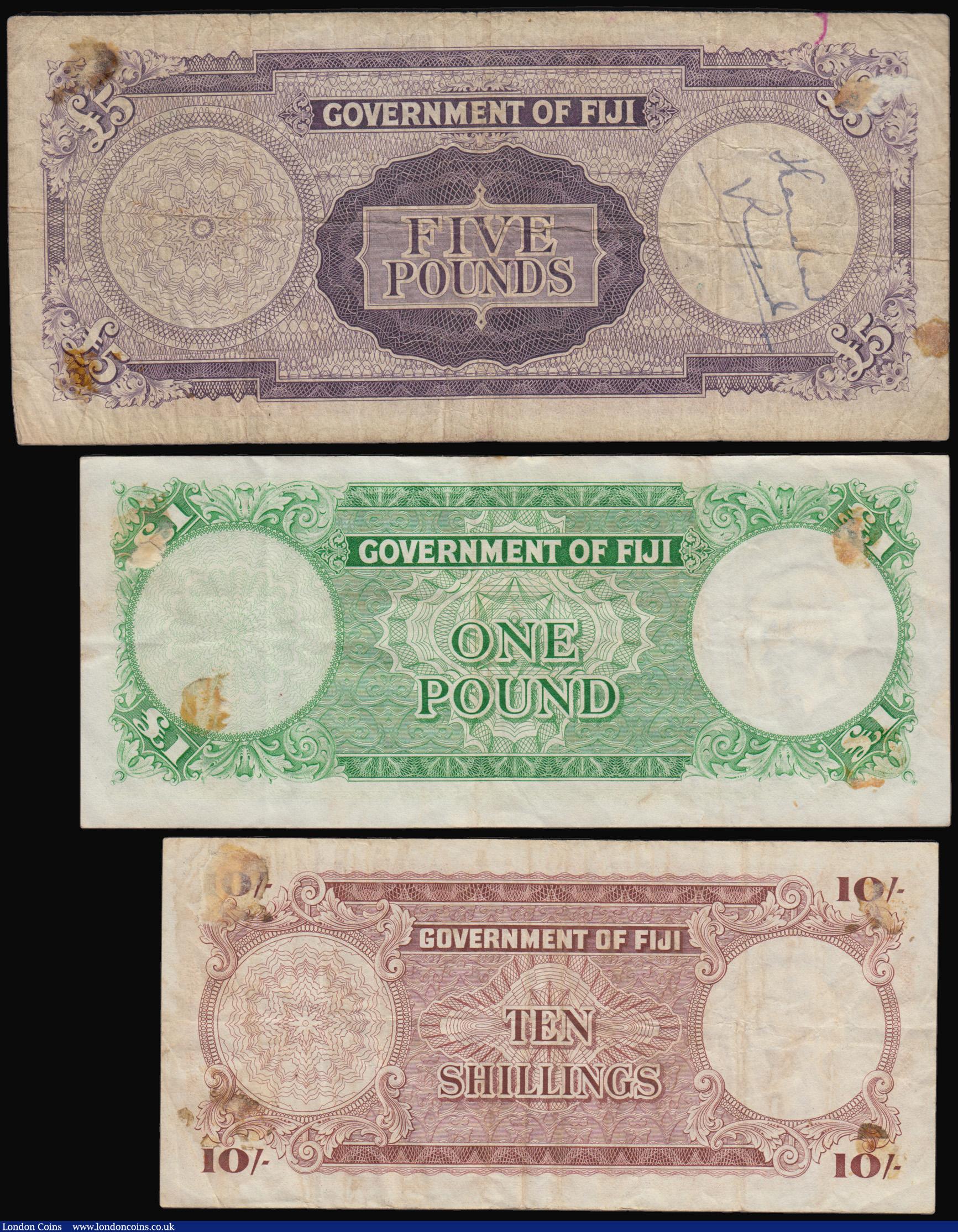 London Coins : A193 : Lot 109 : Fiji Young QEII at right (3) 5 Pounds 1.9.1959 Fine with some inked annotations, 1 Pound 1.12.1961 V...