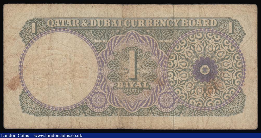 London Coins : A193 : Lot 143 : Qatar & Dubai Currency Board 1 Riyal Pick 1a ND (circa 1960's) about Fine light dirt