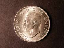 London Coins : A124 : Lot 1358 : Florin 1937       Obv 1 Rev B -- B.S.C. 2071 -- a scarce variety, especially in choice grade UNC