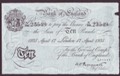 London Coins : A134 : Lot 666 : Ten pounds Peppiatt white B242 dated 17 April 1935 serial K/146 23549, 2 small pinholes, pre...