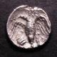 London Coins : A142 : Lot 1785 : Unit Ar. Atrebates. Verica. C,10-20 AD. Obv; COMF in tablet. Rev: Eagle with wings sprea...