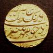 London Coins : A147 : Lot 812 : India Mughal Empire Gold Mohur 18th Century, date largely off flan Good Fine, weight 10.94 grammes