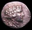 London Coins : A154 : Lot 1561 : Thrace Maroneia Thasos Tetradrachm Obverse Dionysus right, Reverse Bacchus standing, holding grapes ...