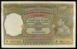 London Coins : A154 : Lot 184 : India 100 rupees KGVI issued 1943 series A/77 967188, Calcutta branch, signed Deshmukh, Pick20e, pin...