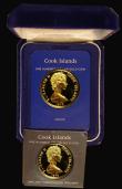 London Coins : A174 : Lot 557 : Cook Islands $100 Gold (2) 1979 The Mask of Tangaroa KM#25 Gold Proof FDC in the Franklin Mint box o...