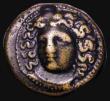 London Coins : A181 : Lot 1246 : Ancient Greece, Larissa, Thessaly. Ae18 Circa 400-344 BC. AE 18mm.Obverse:  Head of nymph facing sli...