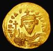 London Coins : A182 : Lot 2085 : Byzantine Gold Solidus Phocas (602-610AD) Constantinople. Obverse: Bust facing, draped, crowned and ...